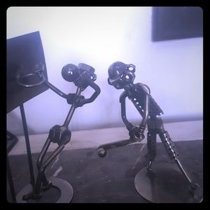 Metal basketball and baseball guy